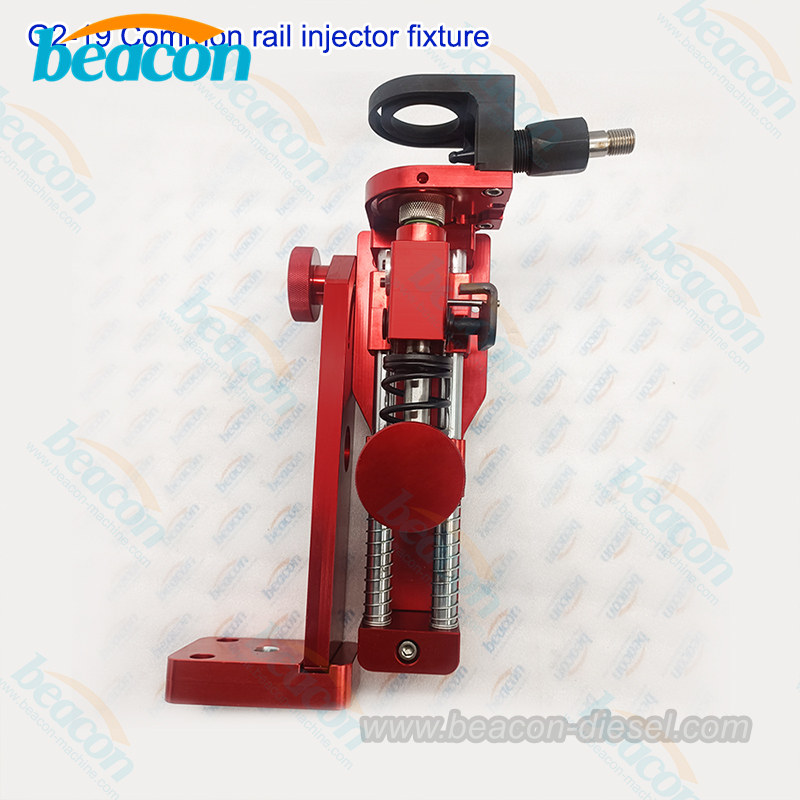 G2-19 common rail injector clamping fixture mounted on a test bench.